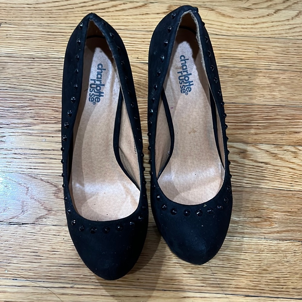 Black high heels with round spikes around